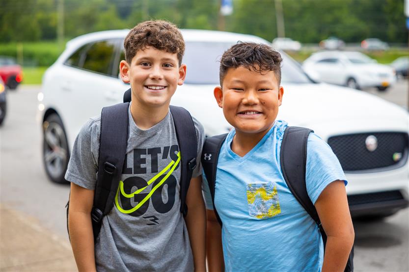 People smile on the first day of school